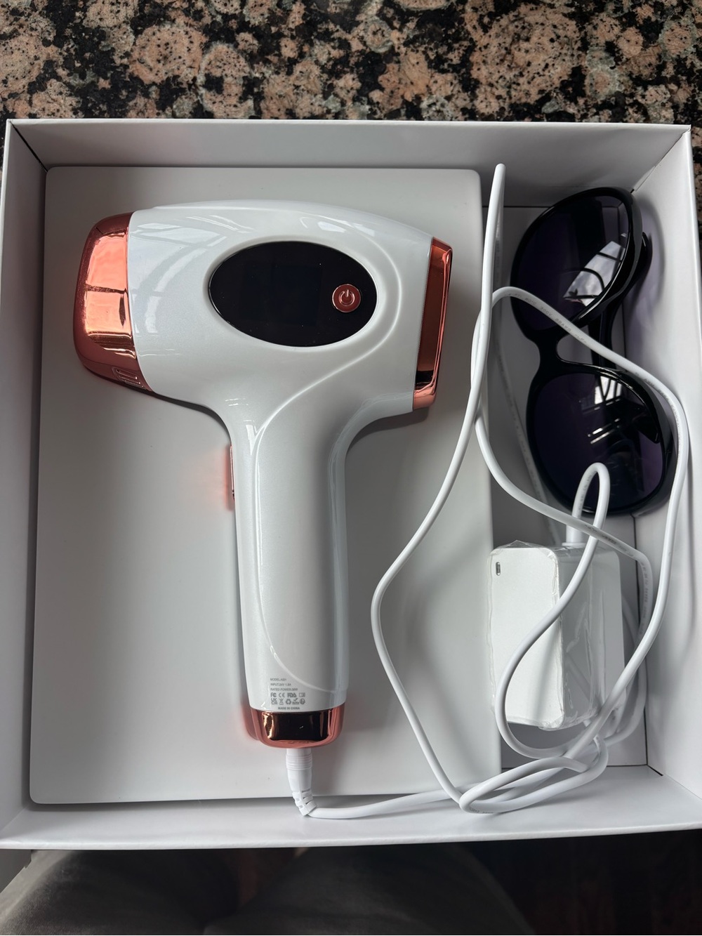 Handheld IPL Hair Removal Device in White & Rose Gold